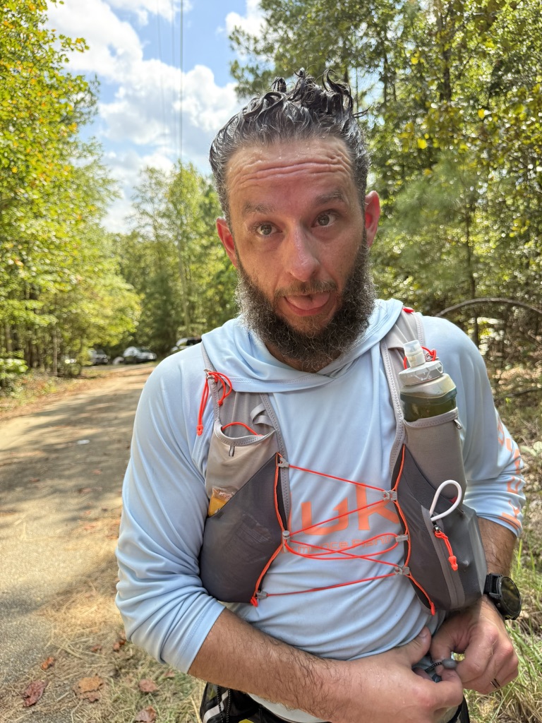 Nick mid-race at Rebecca Mountain 50 Miler, soaked in sweat