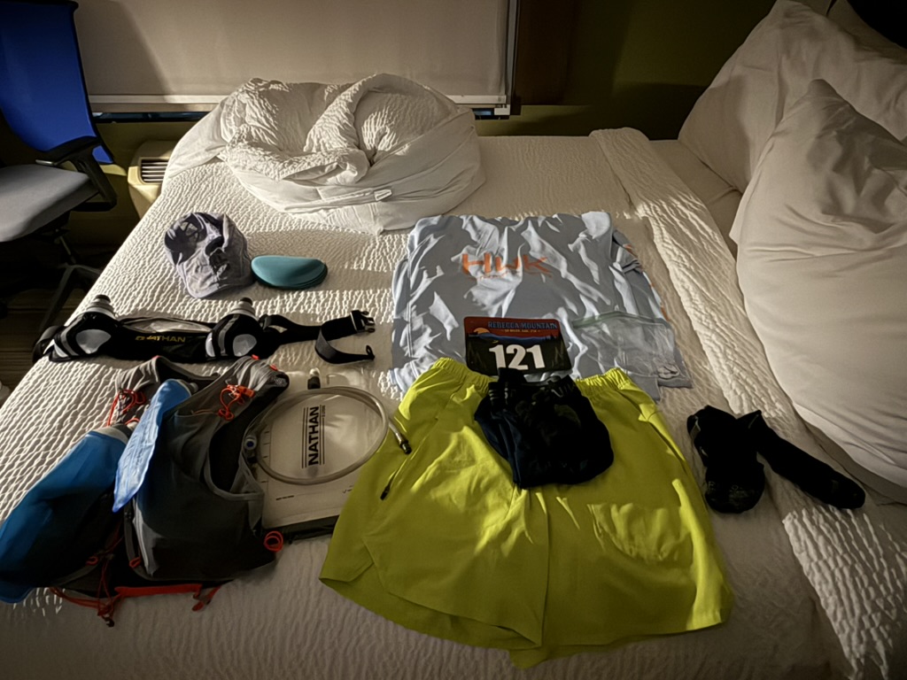 Race gear laid out before the Rebecca Mountain 50 Miler
